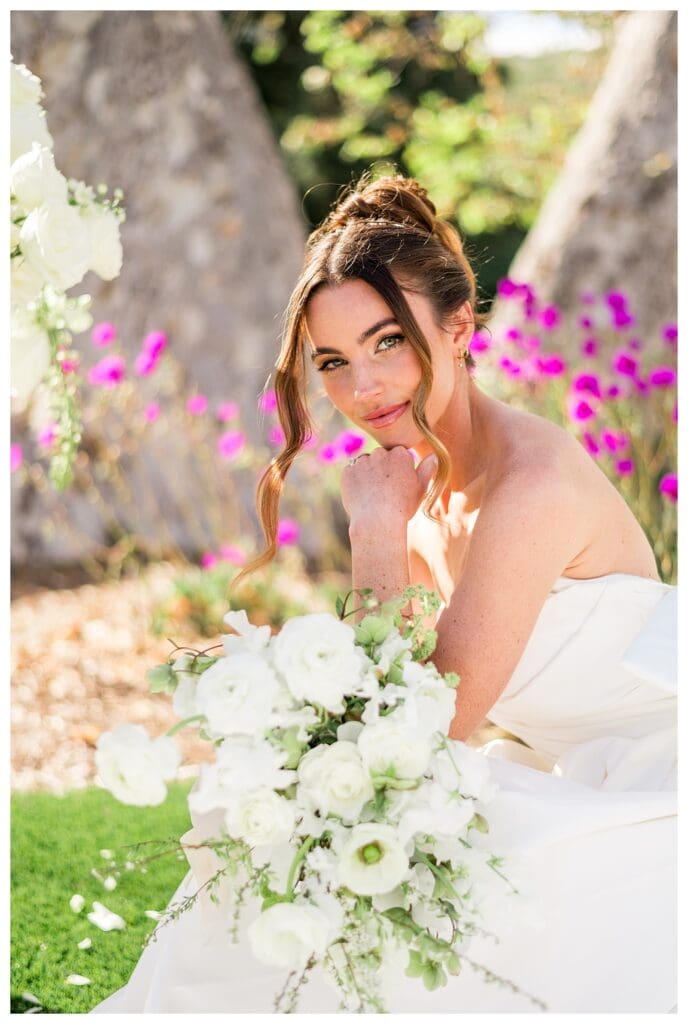 Sunlit bridal portrait taken by a destination wedding photographer at Monserate Winery