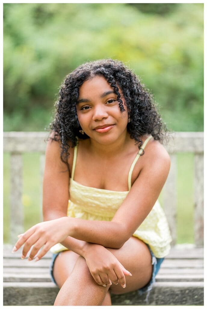 Andover High School senior glowing in sunset light at Acton Arboretum.