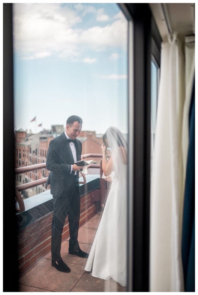 Emotional first look on balcony at Boston Marriott Long Wharf.