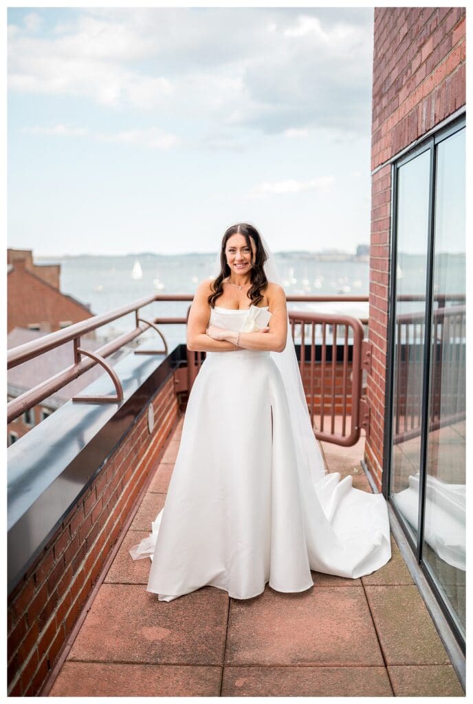 Bridal portrait on balcony at waterfront Boston Wedding venue.