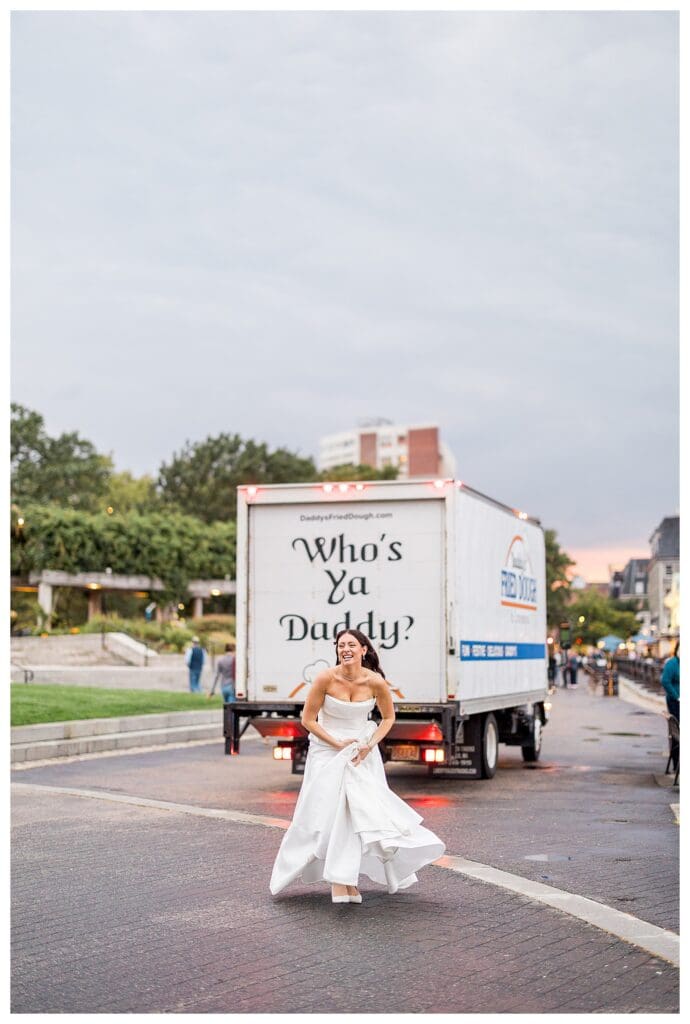 Playful Boston Wedding portrait with Daddy's Fried Dough truck backdrop.