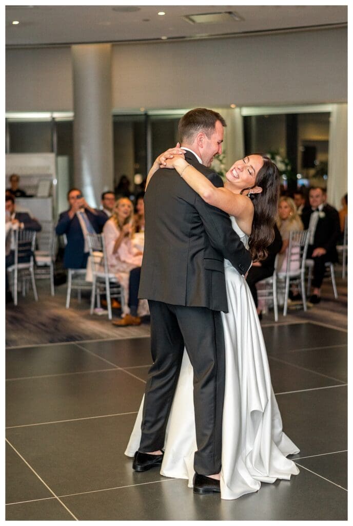 Bride laughing during reception at Boston Wedding.