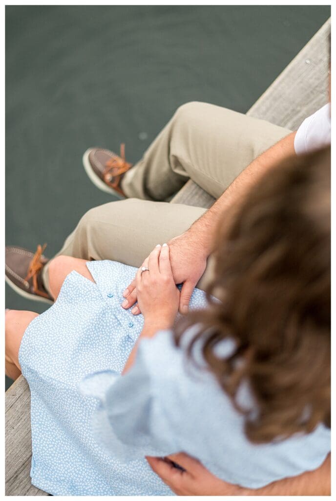 Detail photo of couple relaxing together during engagement session in Boston