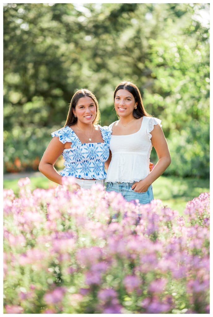 Twin seniors Lila and Charlotte at Elm Bank garden in Wellesley
