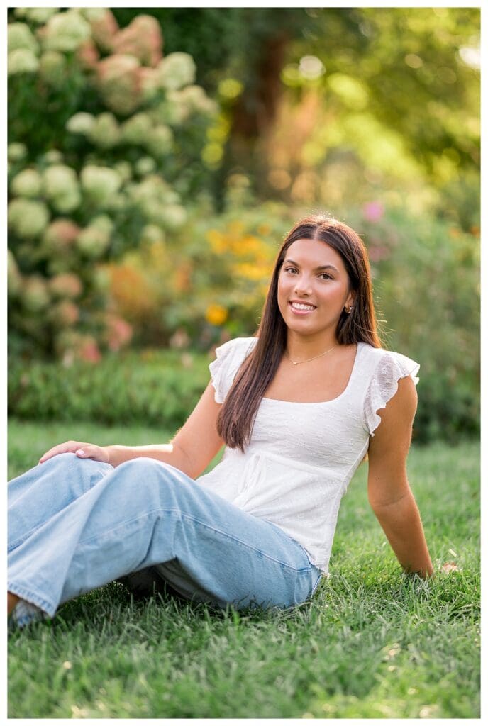 Senior girl sitting at Elm Bank garden