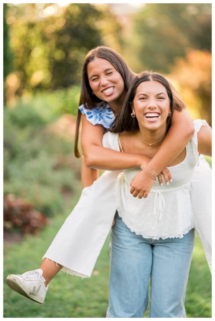 Twin seniors doing a piggyback ride