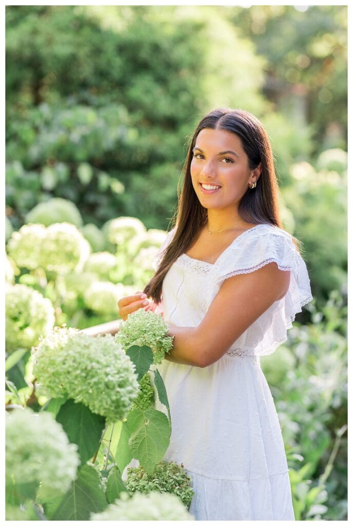 Dana Hall senior photos with hydrangea garden setting