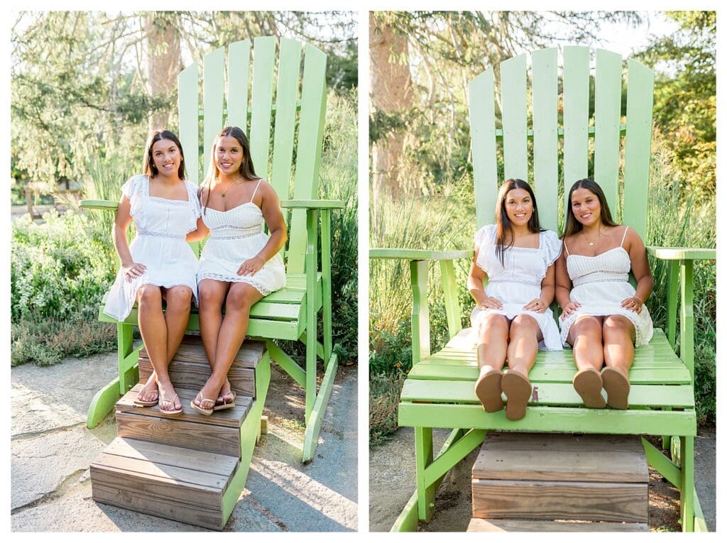 High school senior twins sitting on green Adirondack chair at Elm Bank