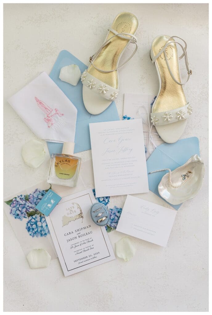 Wedding invitation suite with coastal blue accents