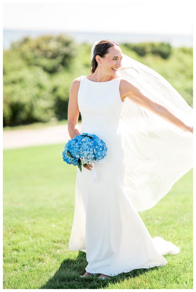 Bride portrait in simple coastal wedding dress