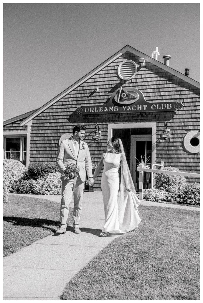 Black and white couple portrait outside Orleans Yacht Club