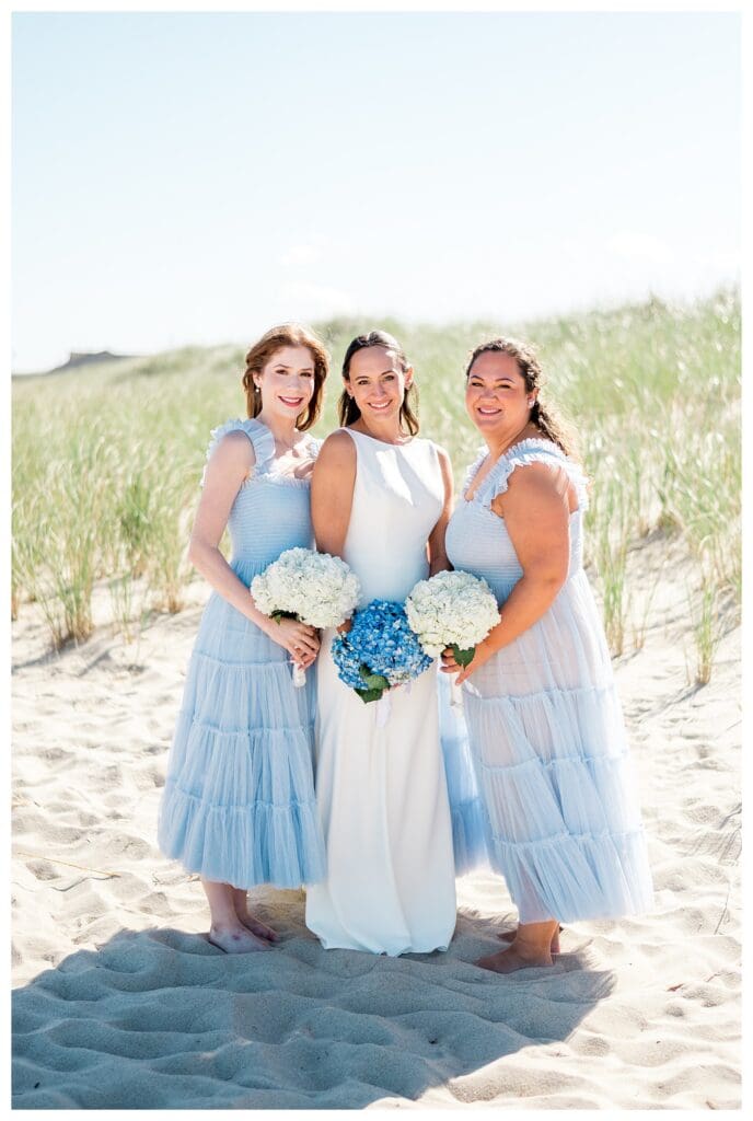 Bridesmaids group portrait coastal wedding