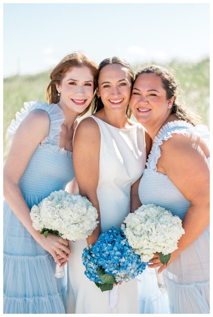 Bridesmaids holding hydrangeas close up