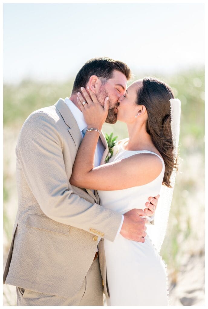 Couple kissing close up beach portrait
