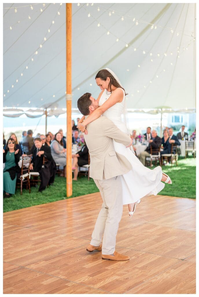 Bride and groom first dance in tent