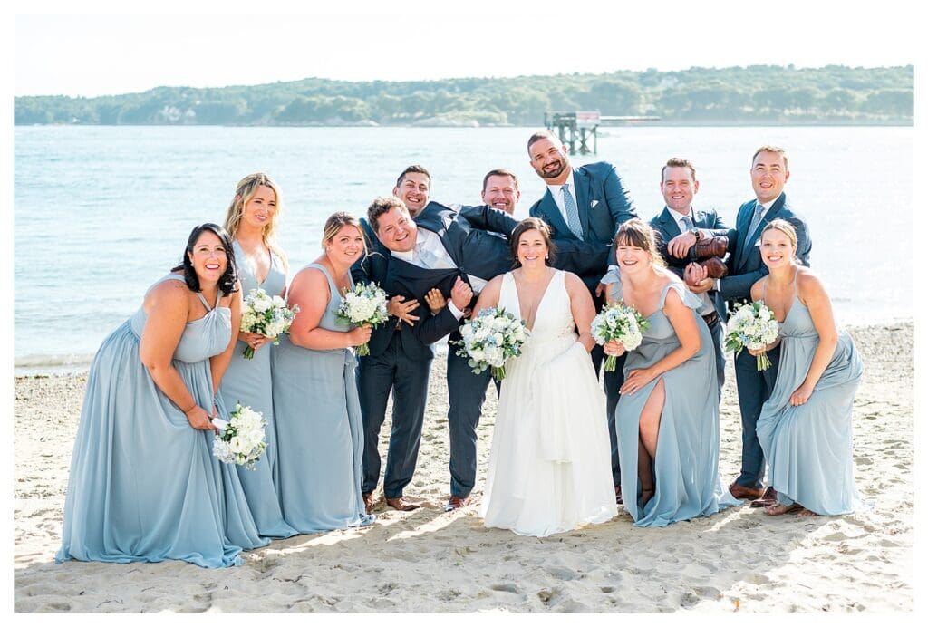 Wedding party celebrating on the beach at Beauport Hotel Gloucester