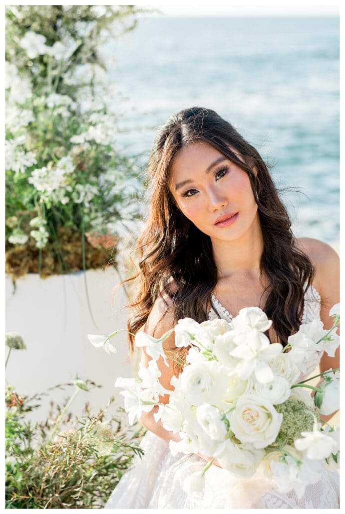 Bride portrait with ocean backdrop at Sunset Cliffs San Diego elopement photography by Sarah Surette