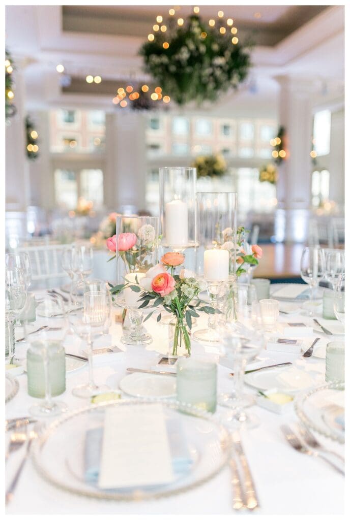 Reception ballroom detail with white and green floral centerpieces at Boston Harbor Hotel