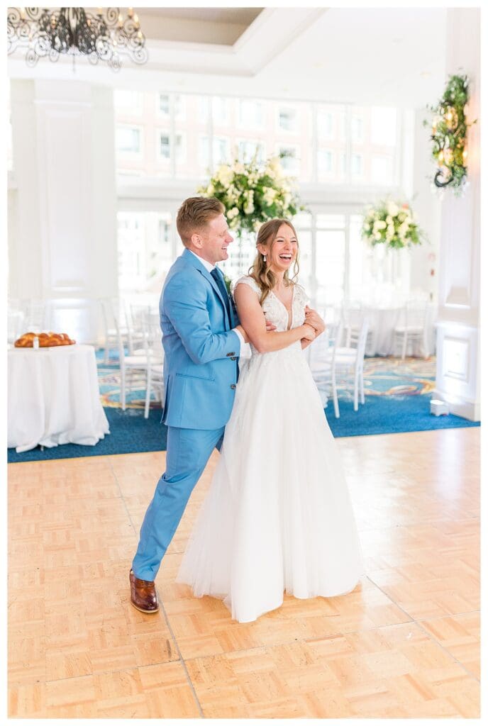 Bride and groom dancing together during reception at Boston Harbor Hotel