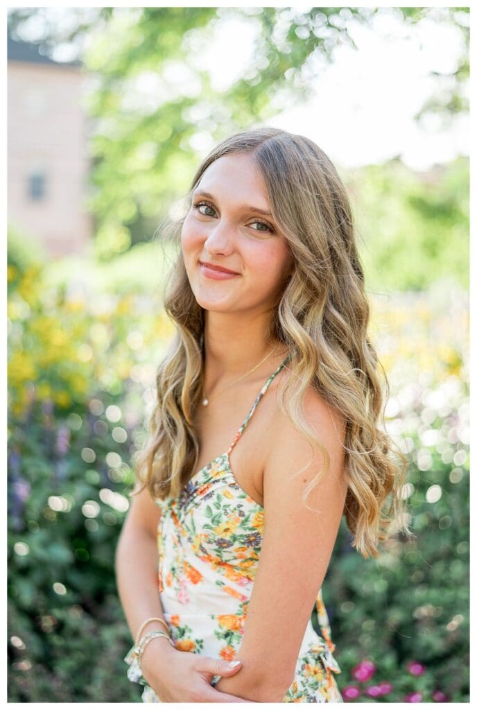 Close up garden portrait of a senior girl in a floral dress, Prescott Park, New England Senior Photos
